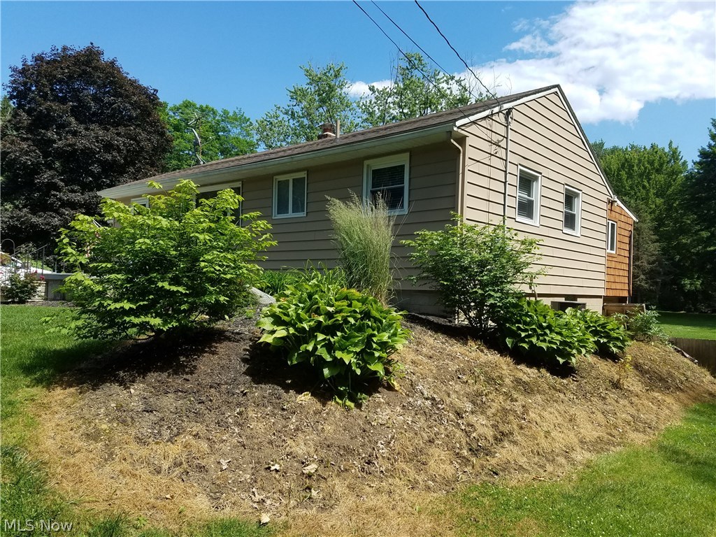 48061 North Ridge Road Amherst, OH 44001 - Photo 2 of 22 Professionally landscaped Private Lot
