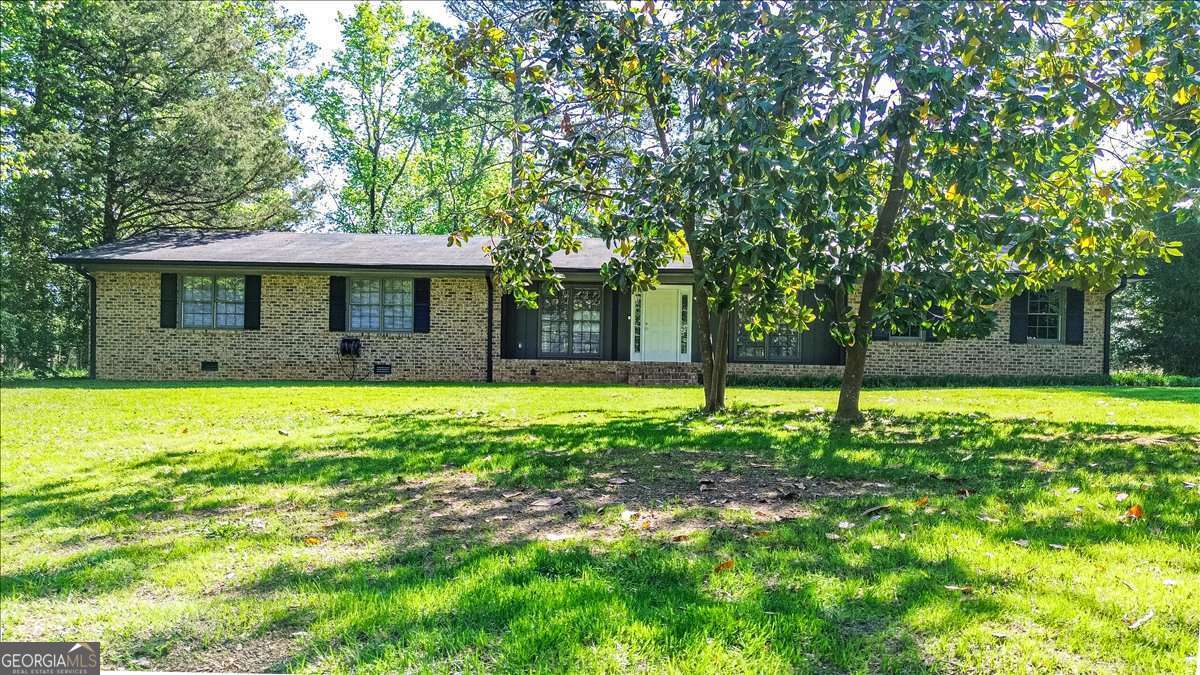 148 Bunker Drive Athens, GA 30607 - Photo 2 of 38 a view of a house with yard and tree s