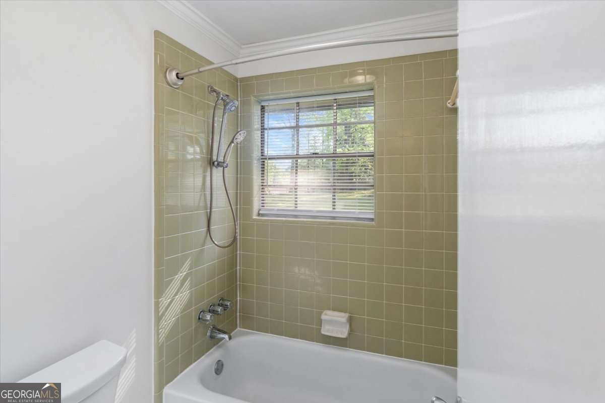 148 Bunker Drive Athens, GA 30607 - Photo 21 of 38 a bathroom with a tub and shower
