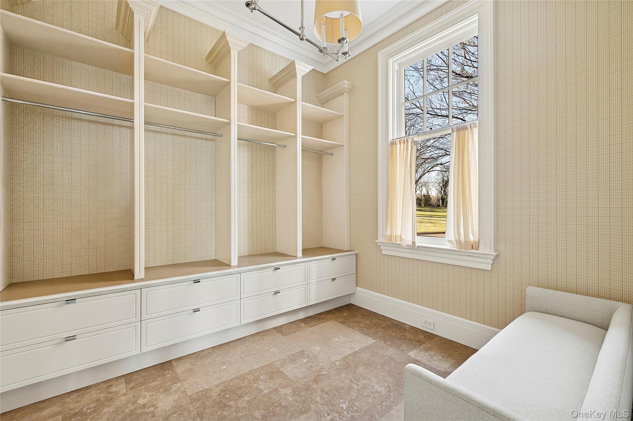30 Forest Drive Sands Point, NY 11050 - Photo 23 of 27 a view of an empty room with wooden floor and cabinet