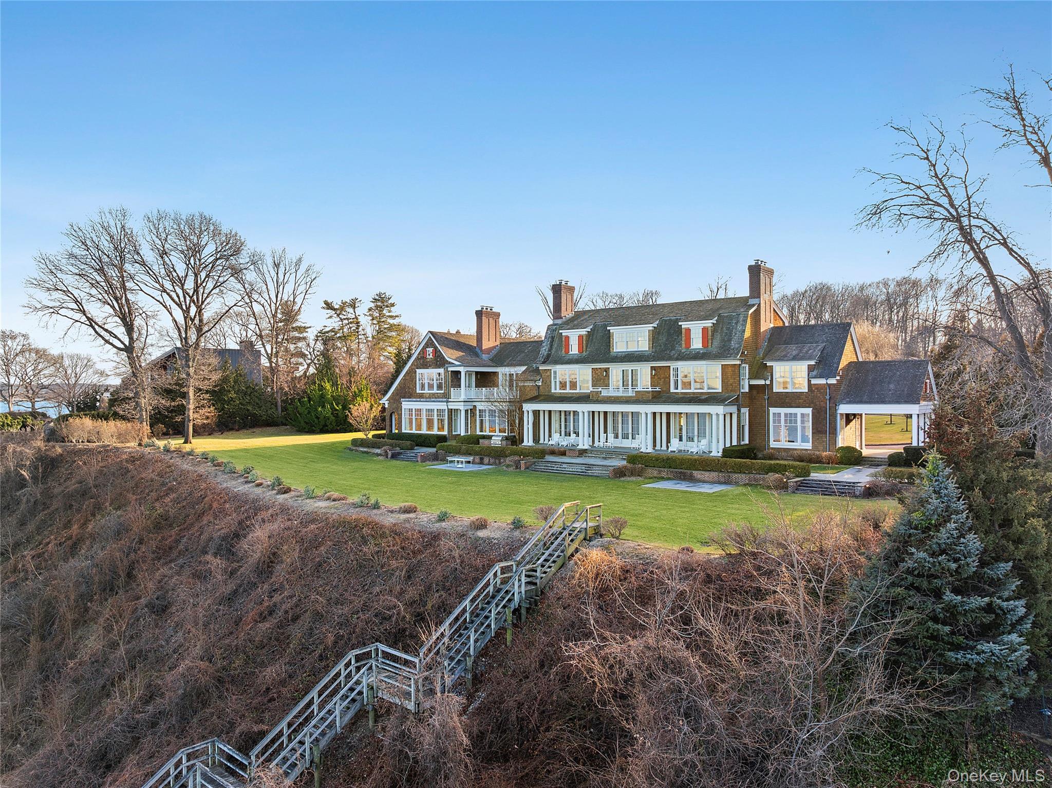 30 Forest Drive Sands Point, NY 11050 - Photo 27 of 27 a view of a house with a yard and sitting area