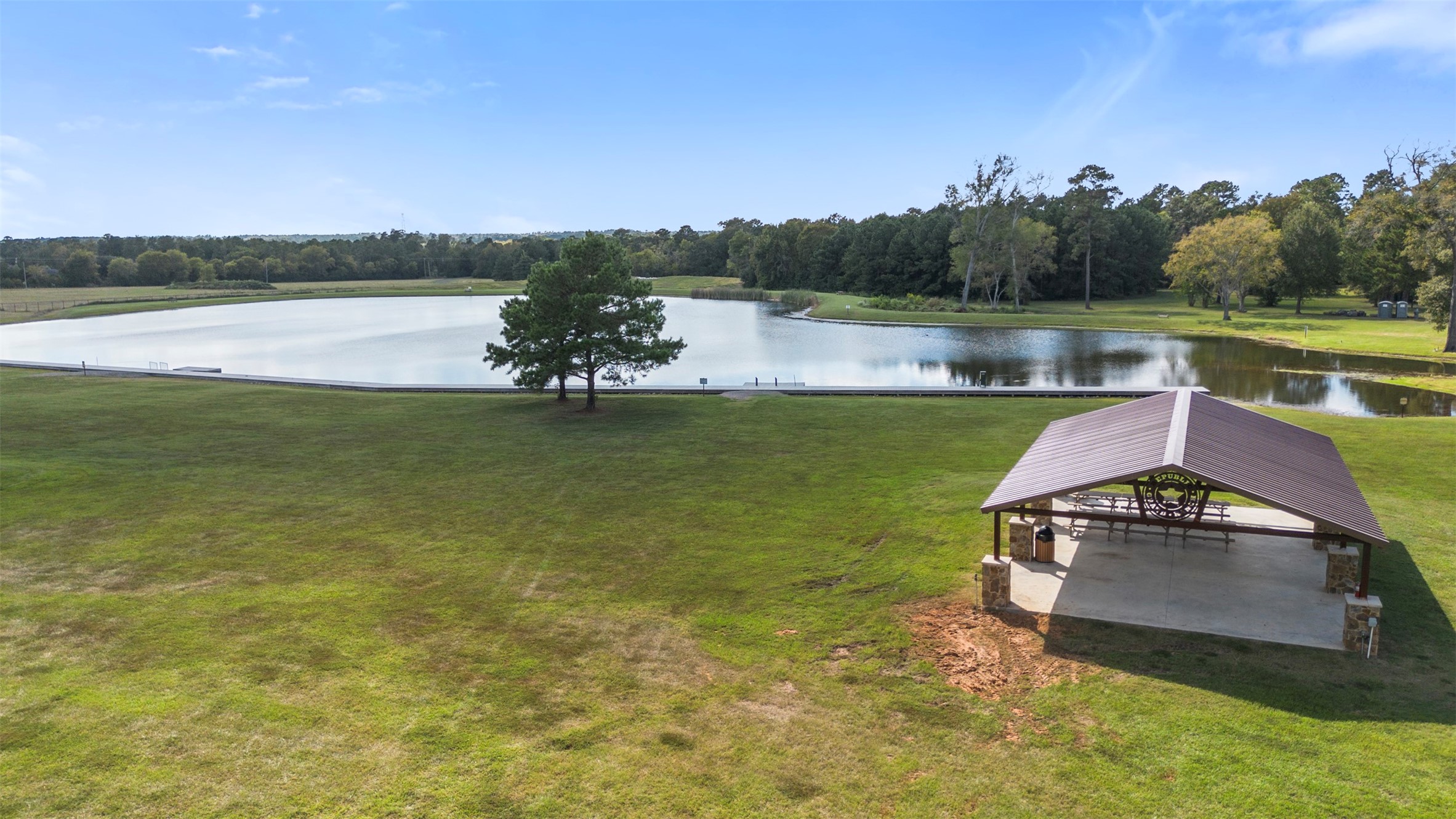 15896 Ridge Oak Road Willis, TX 77378 - Photo 3 of 23 a view of a lake with a mountain in the background
