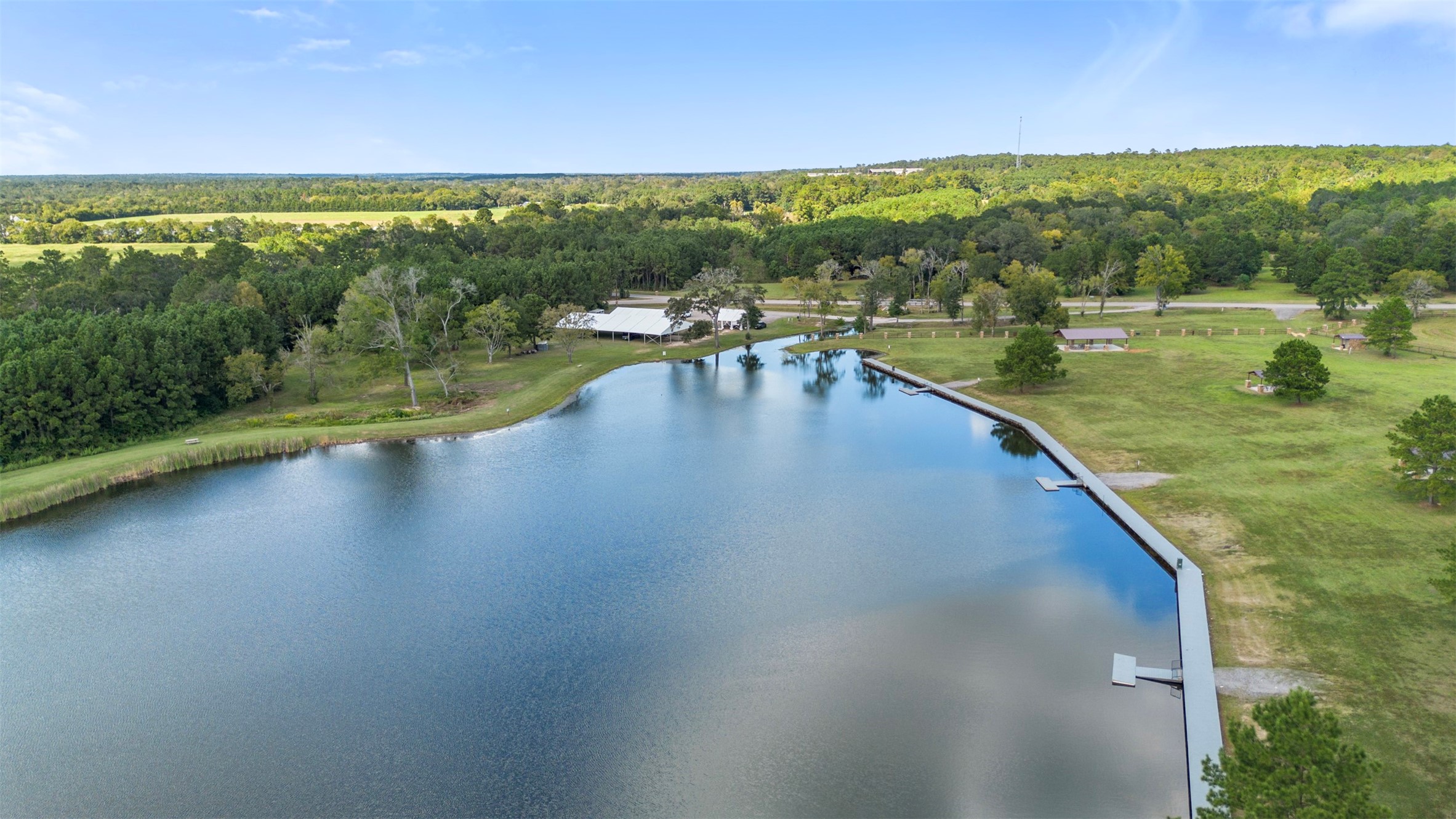 15896 Ridge Oak Road Willis, TX 77378 - Photo 4 of 23 a view of a lake with a mountain view