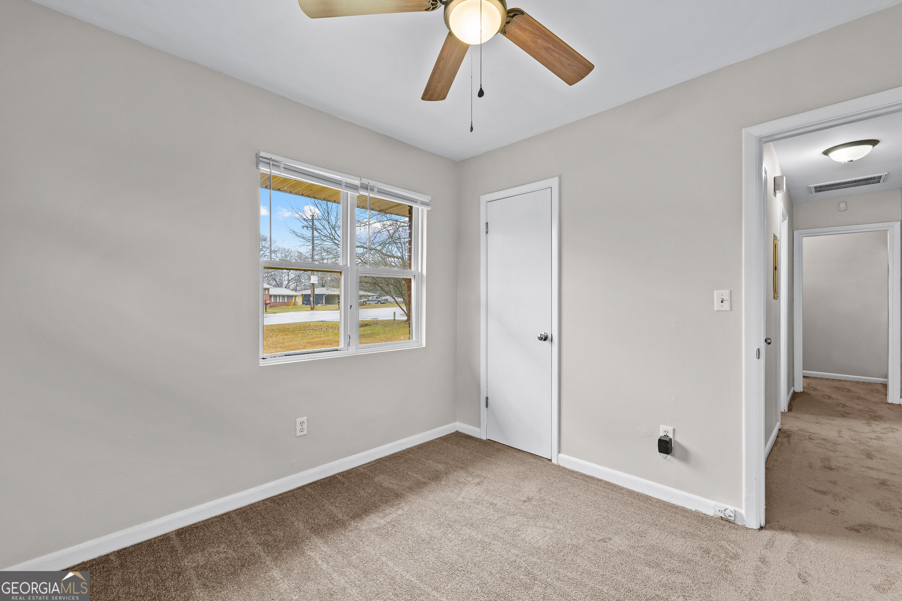 257 Fayetteville Road Fairburn, GA 30213 - Photo 15 of 31 a view of an empty room with window