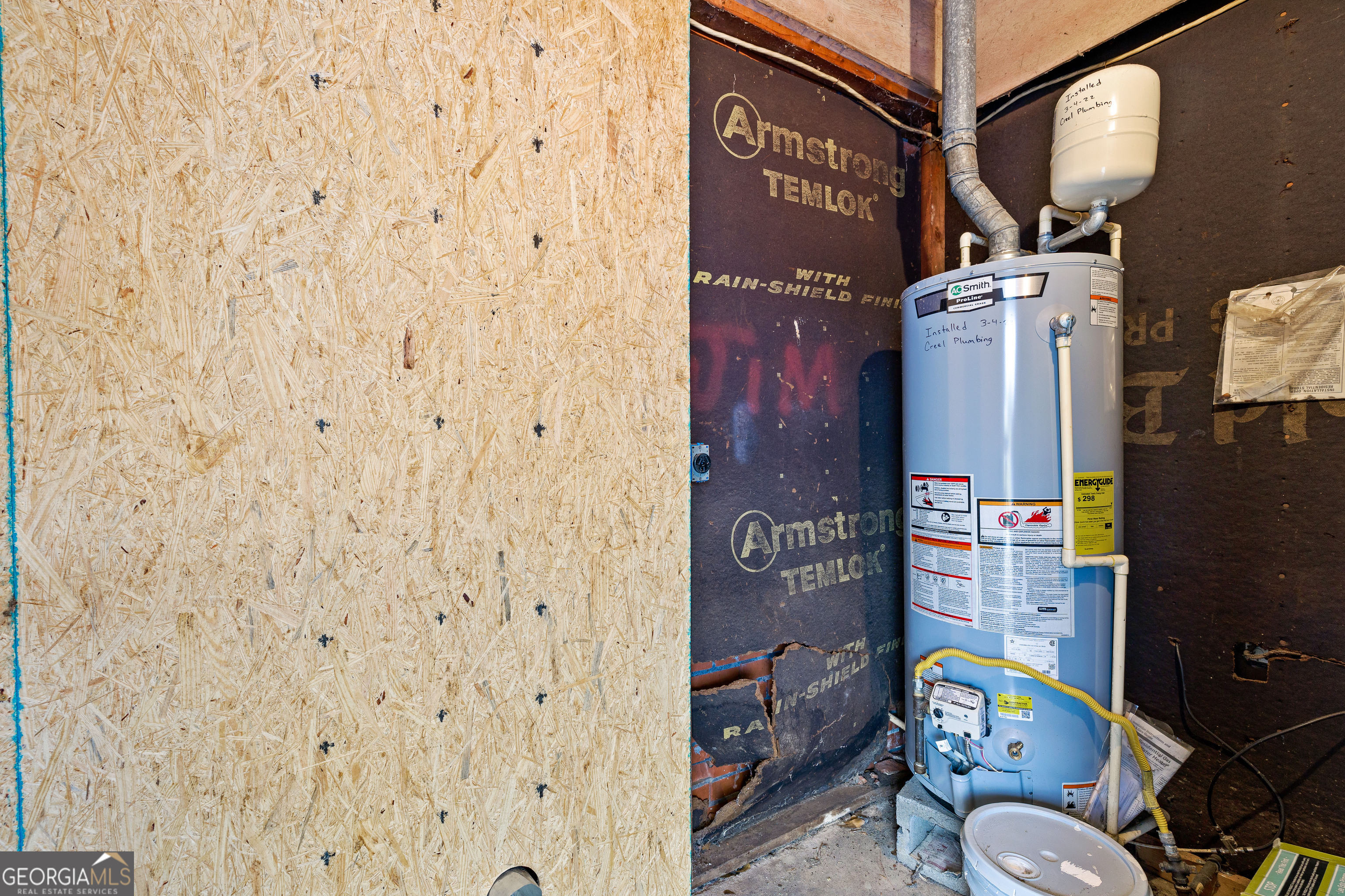 257 Fayetteville Road Fairburn, GA 30213 - Photo 23 of 31 a bathroom with a toilet and a shower curtain