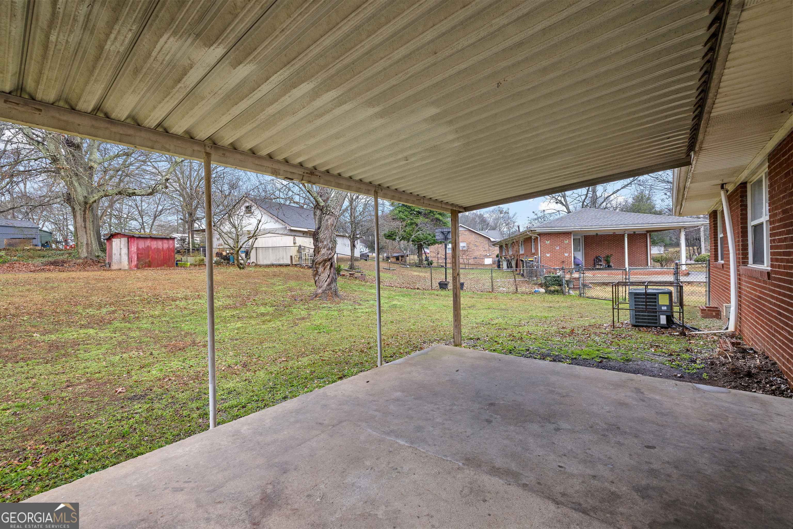 257 Fayetteville Road Fairburn, GA 30213 - Photo 25 of 31 a view of a house with backyard and porch
