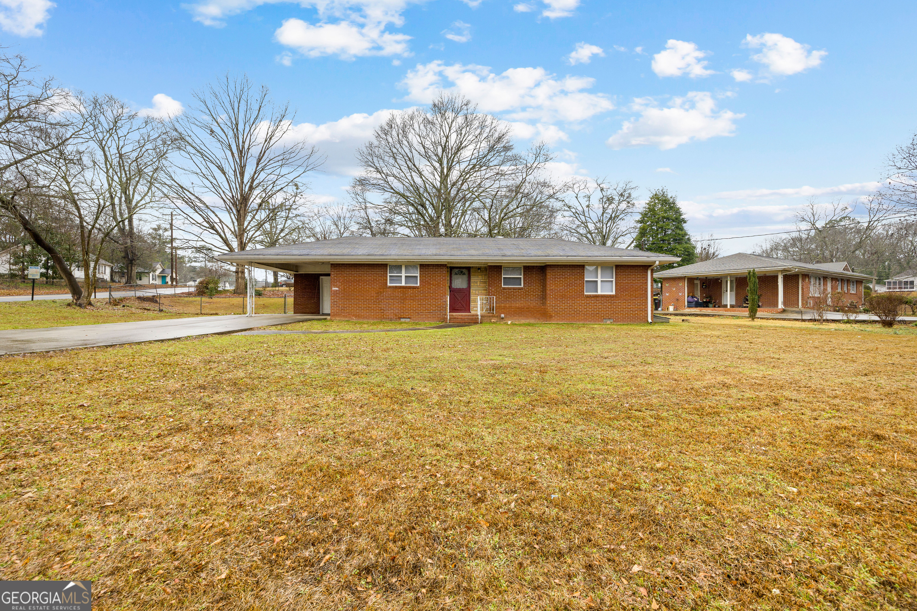 257 Fayetteville Road Fairburn, GA 30213 - Photo 31 of 31 a front view of a house with a garden