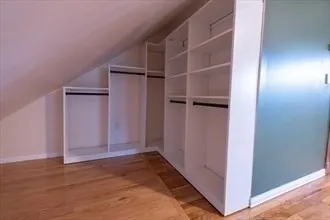 a view of an empty walk in closet