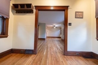 29 Oval Road Quincy, MA 02170 - Photo 9 of 11 a view of a hallway with wooden floor and closet