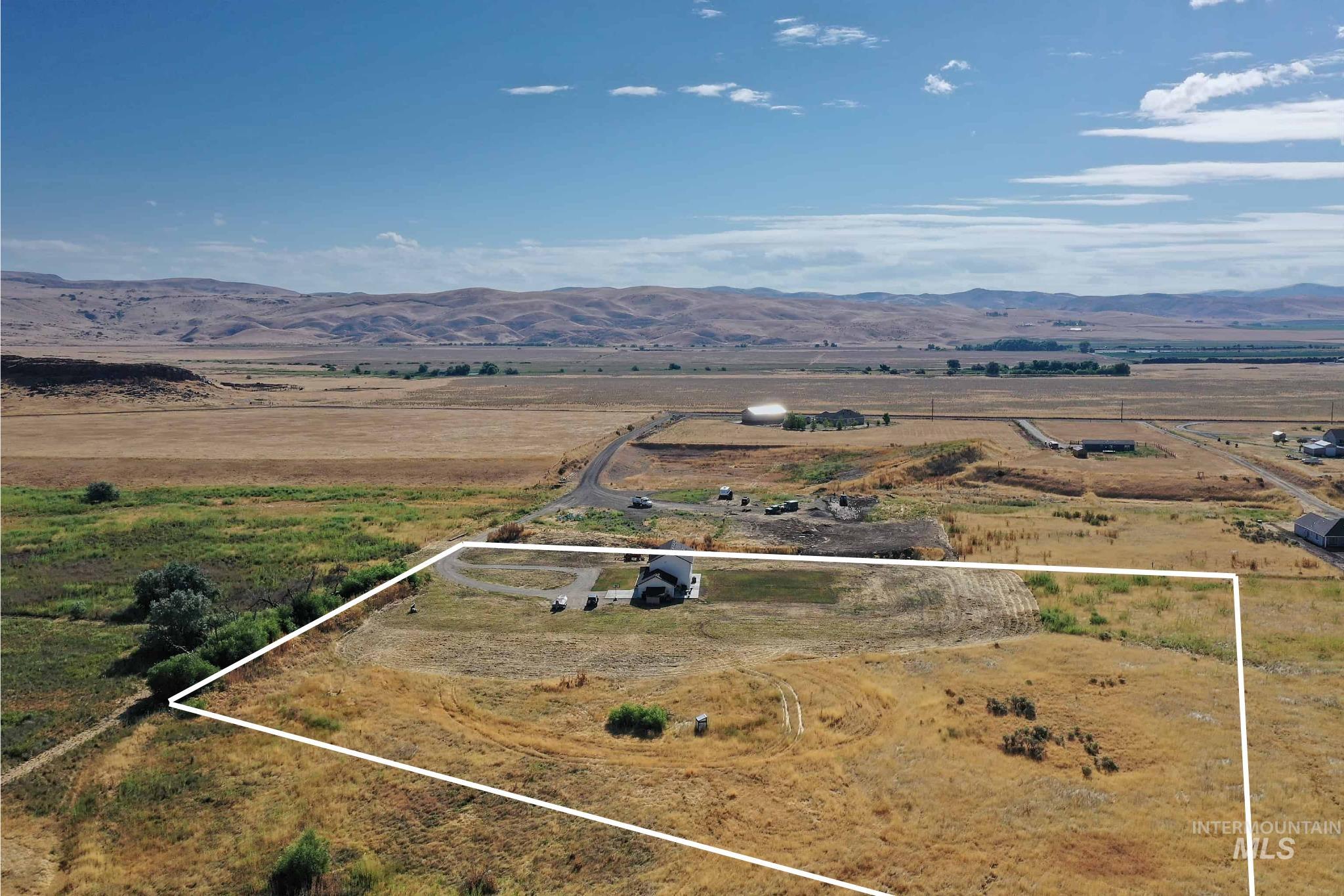 1049 Price Road Weiser, ID 83672 - Photo 41 of 47 Expansive rural property featuring a single-family residence with an attached garage
