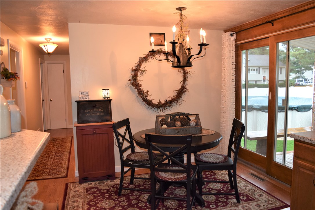 13 Cove Road Coventry, RI 02816 - Photo 5 of 33 Eat-in kitchen with bar top overlooking living room