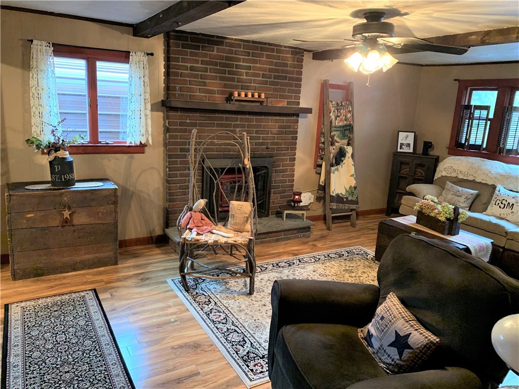 13 Cove Road Coventry, RI 02816 - Photo 9 of 33 Family room with brick fireplace