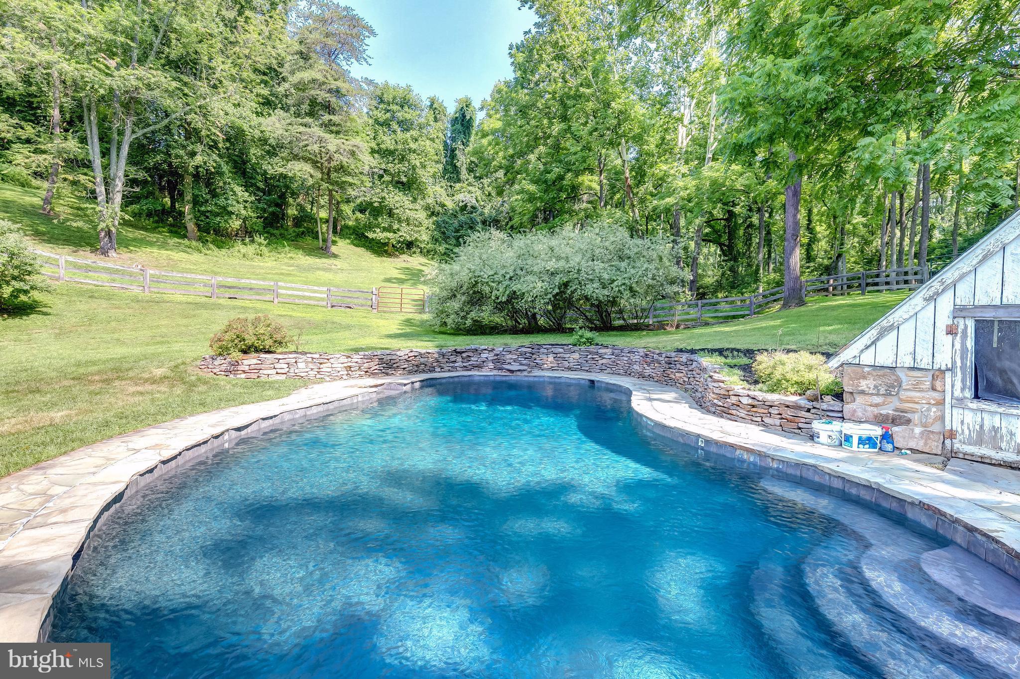 2148 Shepperd Road Monkton, MD 21111 - Photo 2 of 26 a view of a swimming pool with a yard