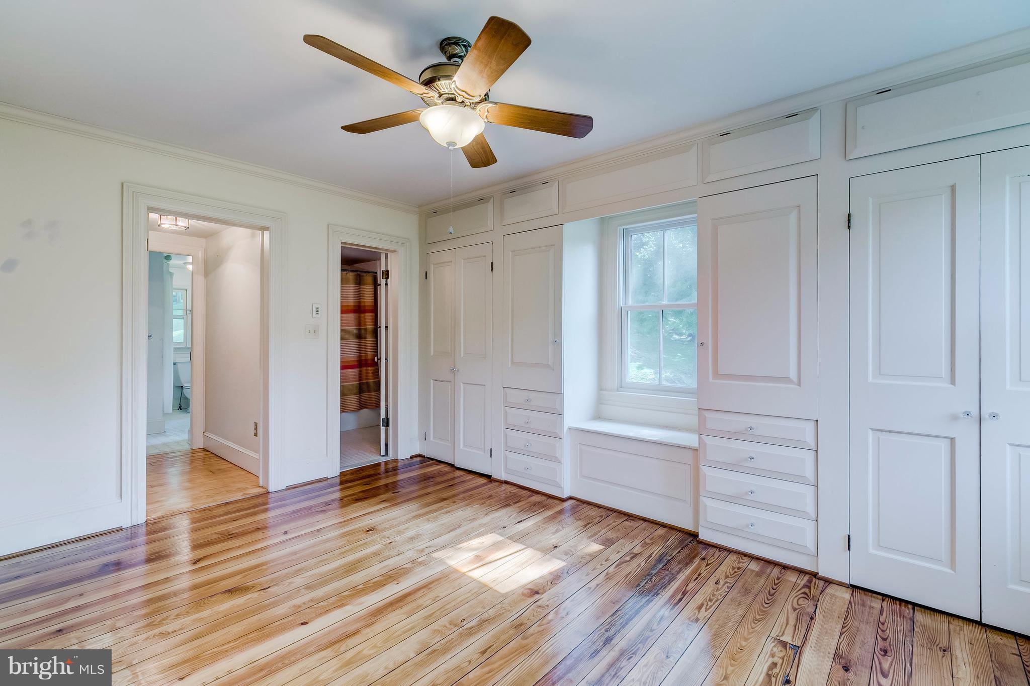 2148 Shepperd Road Monkton, MD 21111 - Photo 11 of 26 an empty room with wooden floor and windows