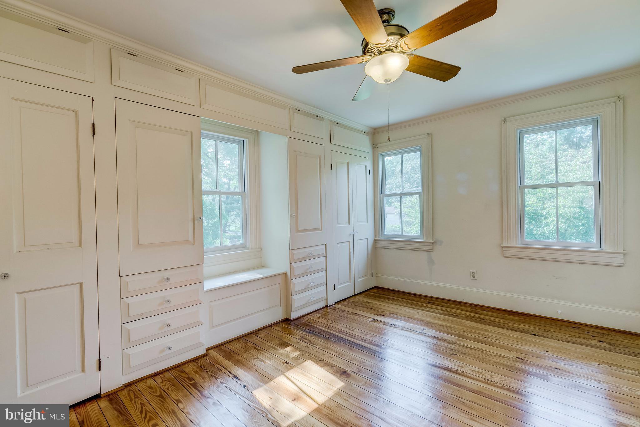 2148 Shepperd Road Monkton, MD 21111 - Photo 12 of 26 a view of an empty room with a window and wooden floor