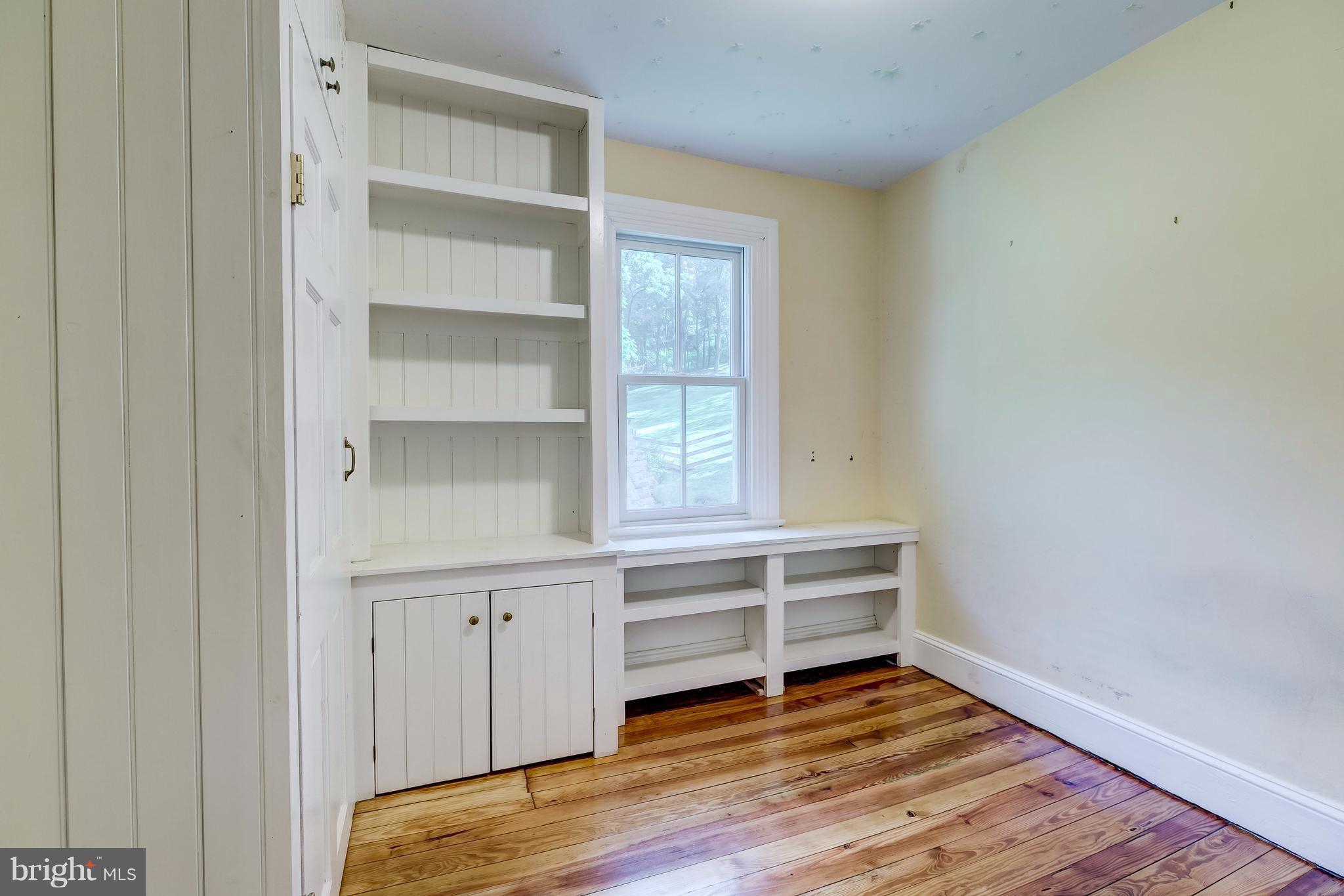2148 Shepperd Road Monkton, MD 21111 - Photo 14 of 26 a view of a room with wooden floor and cabinet