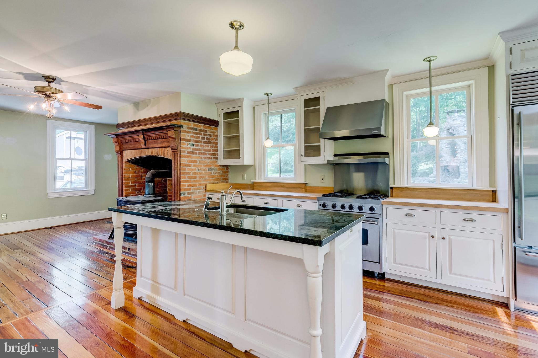 2148 Shepperd Road Monkton, MD 21111 - Photo 10 of 26 a kitchen with granite countertop a sink and cabinets