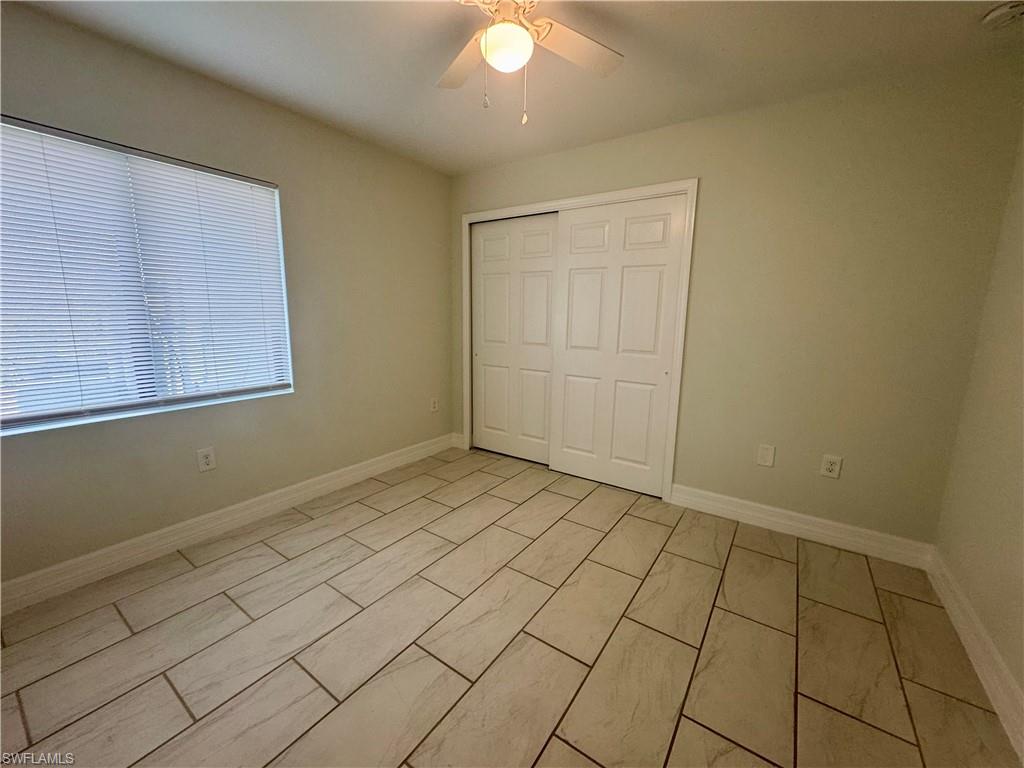7066 Babcock Road Fort Myers, FL 33967 - Photo 14 of 15 a view of an empty room and window