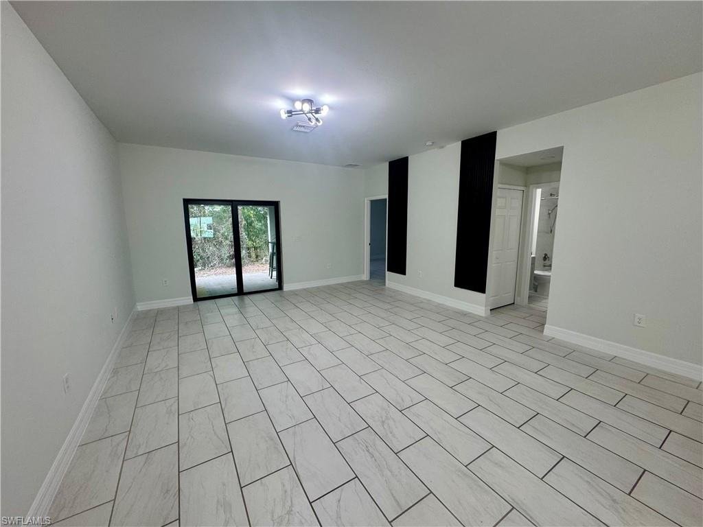 7066 Babcock Road Fort Myers, FL 33967 - Photo 4 of 15 a view of an empty room with window