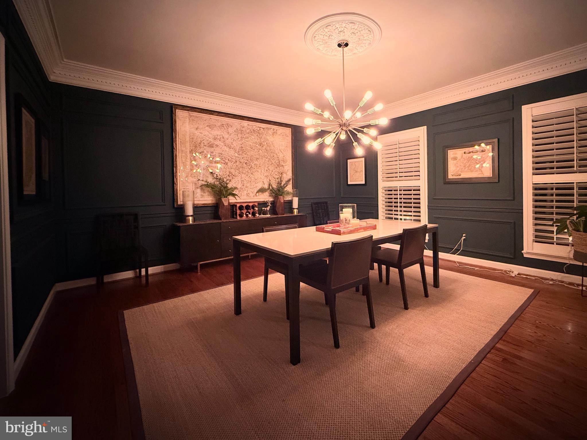 9217 Jeffery Road Great Falls, VA 22066 - Photo 16 of 80 a view of a dining room with furniture window and outside view