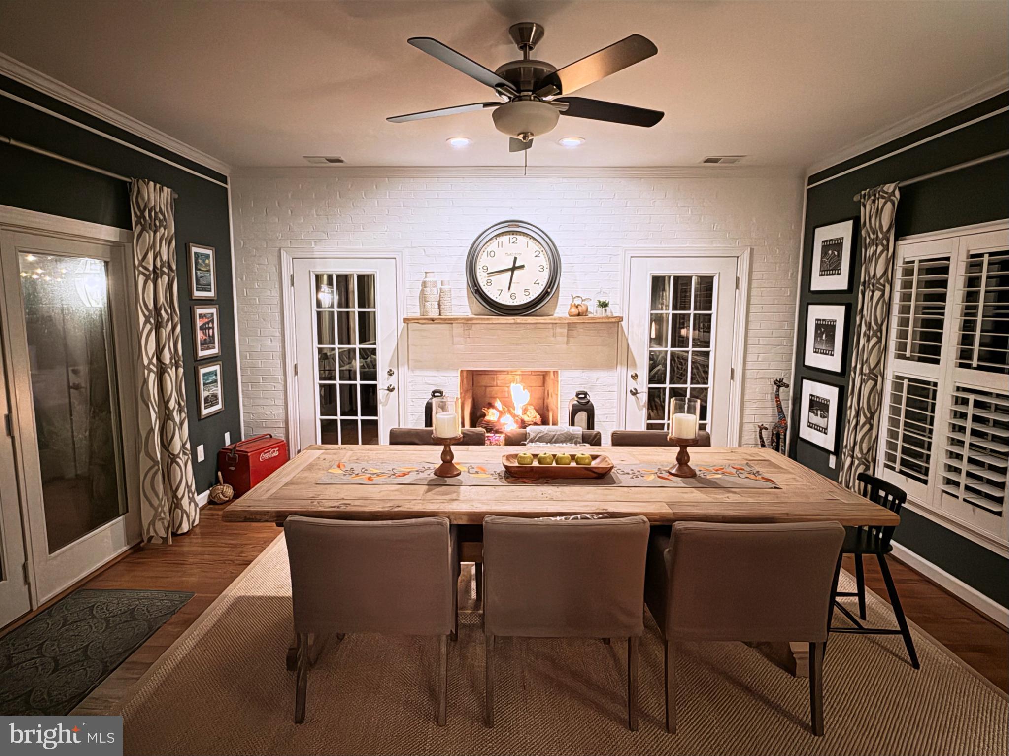 9217 Jeffery Road Great Falls, VA 22066 - Photo 26 of 80 a view of a dining room with furniture and a chandelier