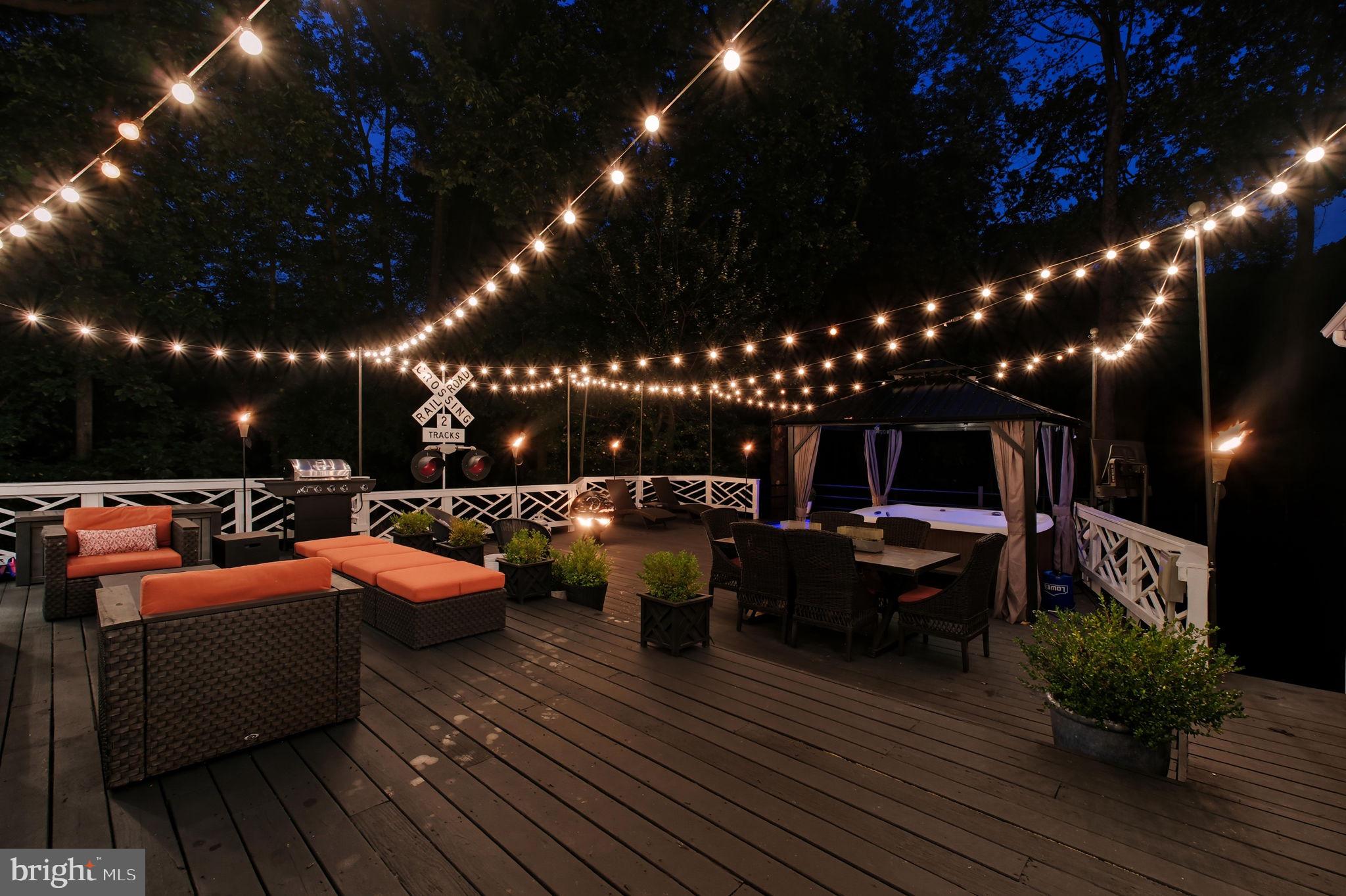 9217 Jeffery Road Great Falls, VA 22066 - Photo 69 of 80 a view of a patio with couches and potted plants