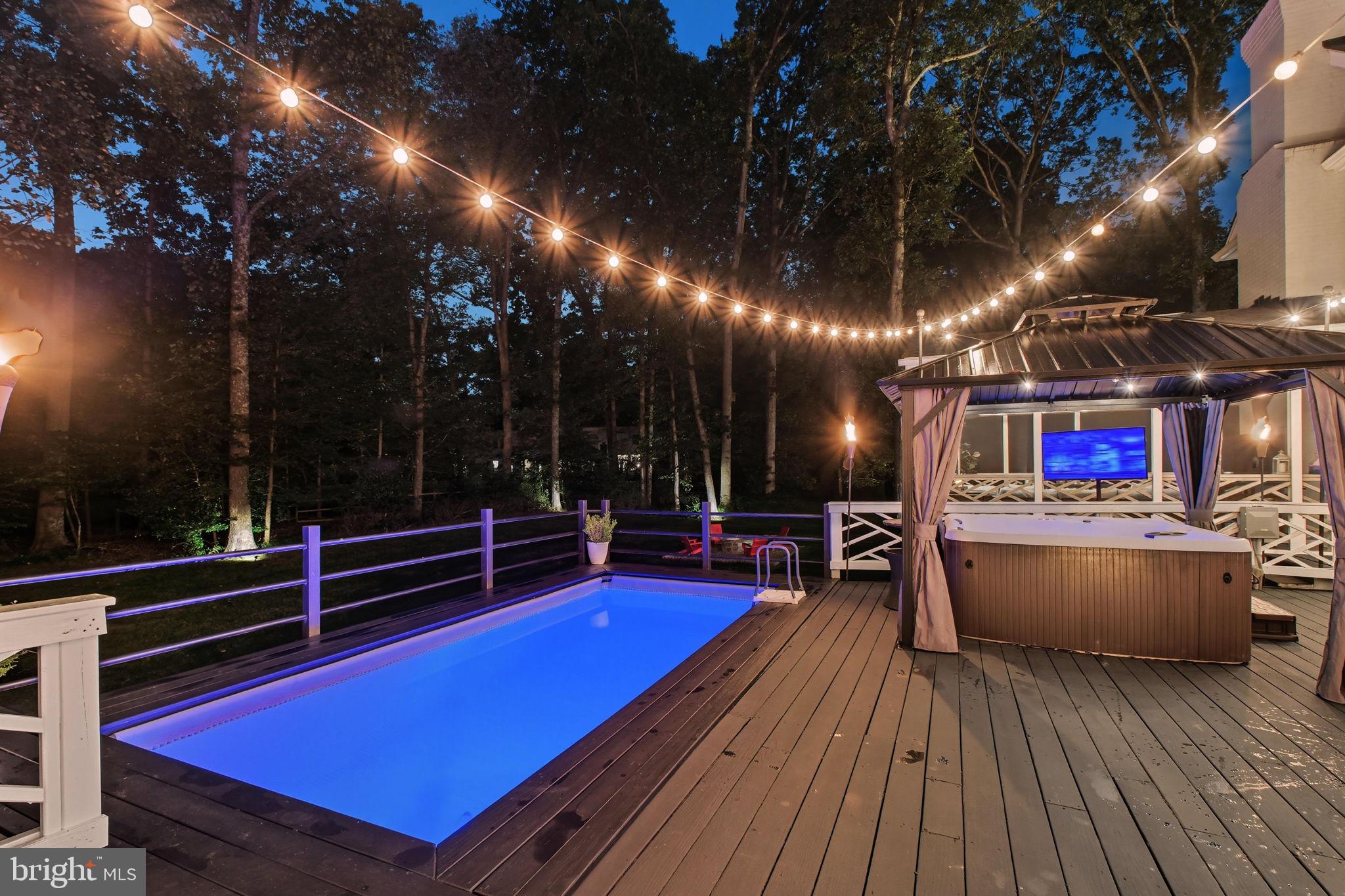 9217 Jeffery Road Great Falls, VA 22066 - Photo 70 of 80 a view of a patio with swimming pool table and chairs