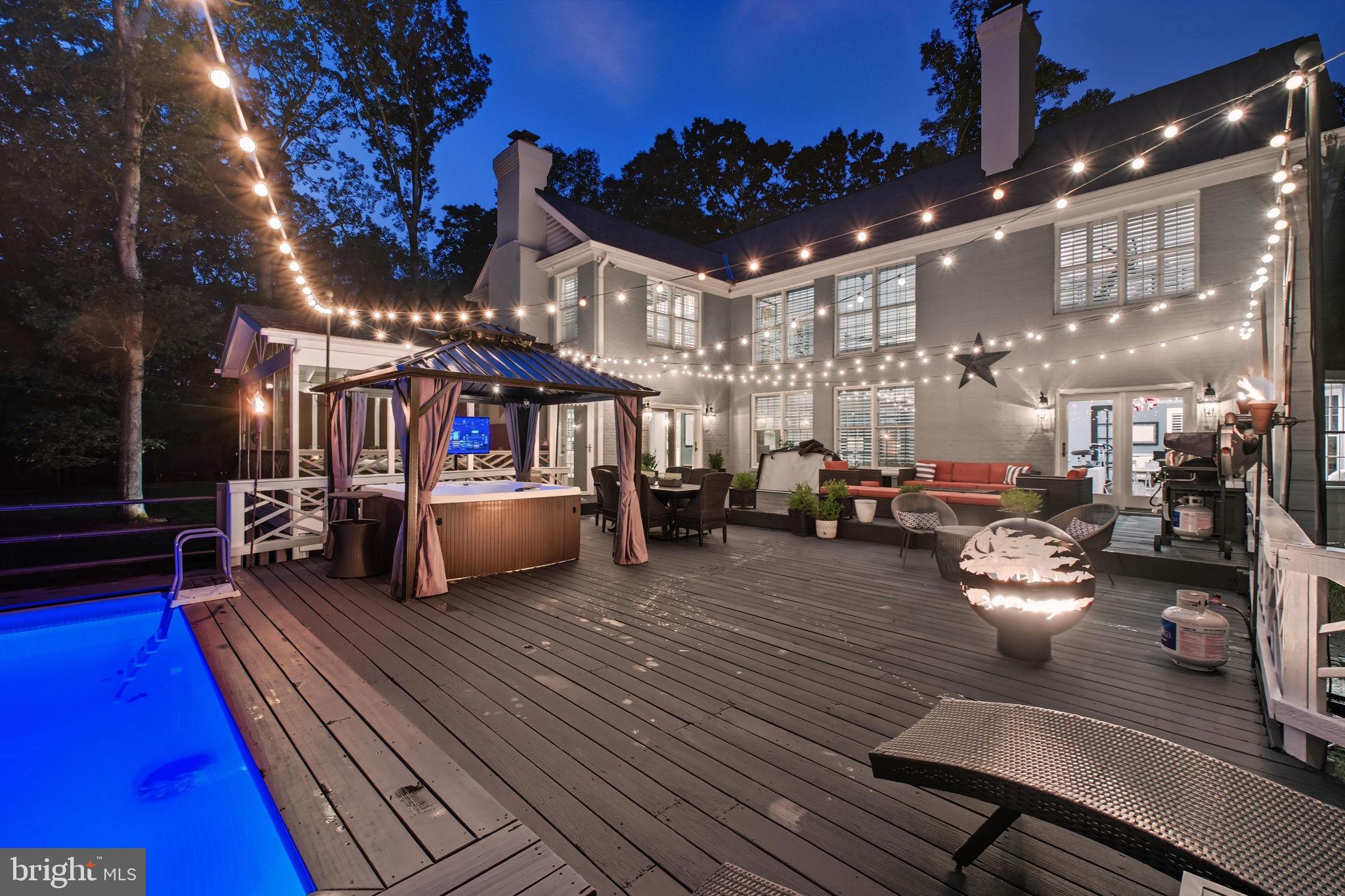 9217 Jeffery Road Great Falls, VA 22066 - Photo 72 of 80 a view of a chairs and tables in the balcony