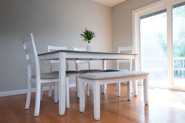 a view of balcony with furniture