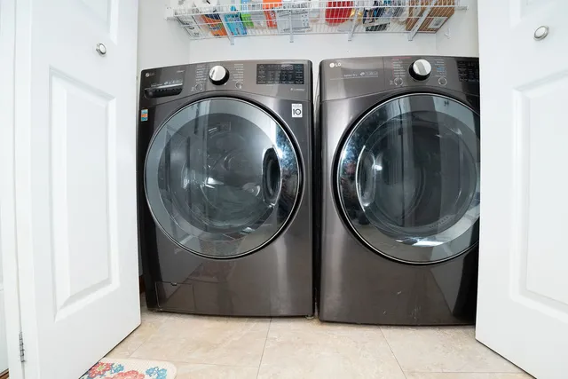 a utility room with dryer and washer