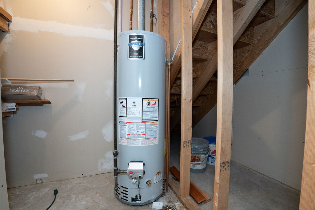 1708 Royal Pointe Drive Bloomington, IL 61704 - Photo 32 of 48 a close view of water heater room