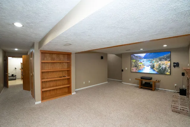 a view of room with furniture and windows