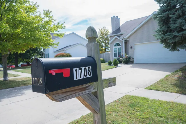 a view of a bench in front of a building