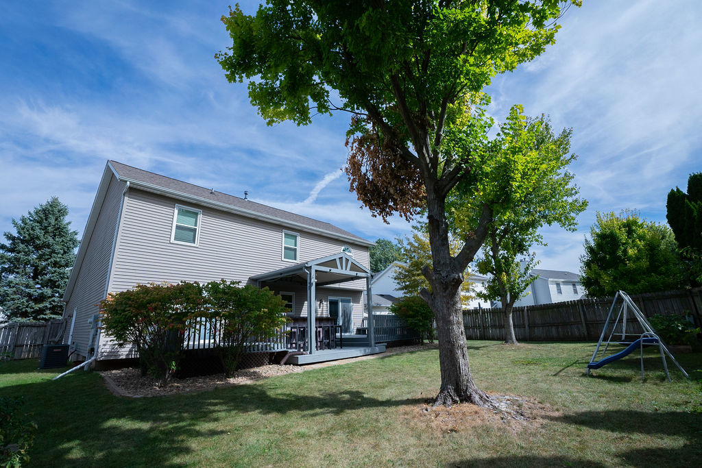 1708 Royal Pointe Drive Bloomington, IL 61704 - Photo 42 of 48 front view of a house with a yard