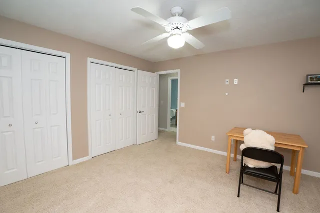 a view of a livingroom with furniture