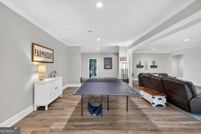 a view of a backyard with a bench and plants