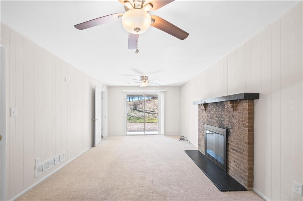 116 Fox Trot Drive Mars, PA 16046 - Photo 15 of 34 a view of an empty room with a fireplace