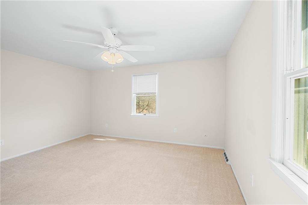 116 Fox Trot Drive Mars, PA 16046 - Photo 16 of 34 an empty room with a window and ceiling fan