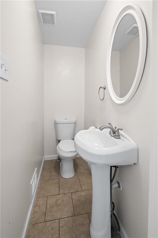 116 Fox Trot Drive Mars, PA 16046 - Photo 10 of 34 a bathroom with a sink a toilet and a mirror