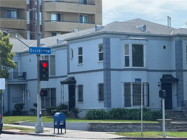a house view with a garden space