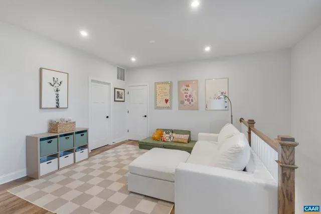 a living room with furniture and a couch