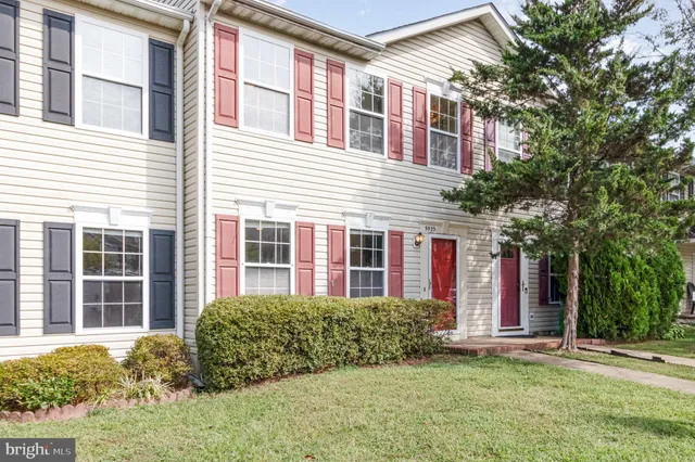 a view of a house with a garden