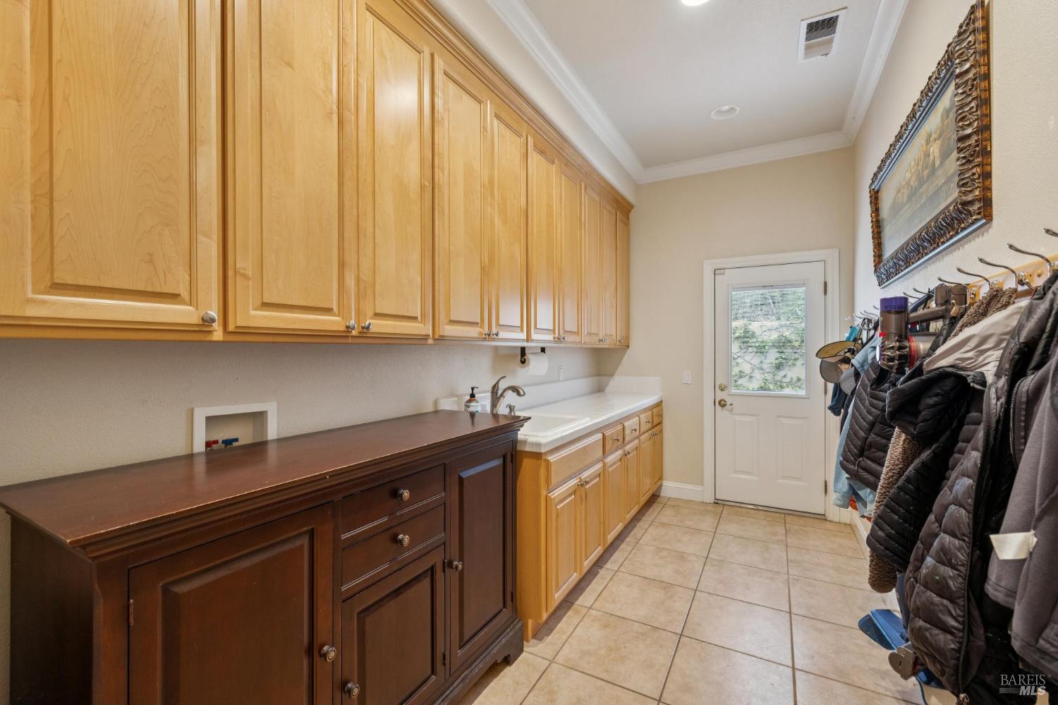 2588 Vineyard Road Novato, CA 94947 - Photo 66 of 69 The upstairs mud room , with secondary access from the large parking area. This is plumbed for a main floor laundry room as well.