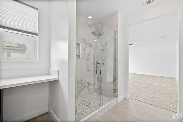 a outdoor space with a couch and chairs