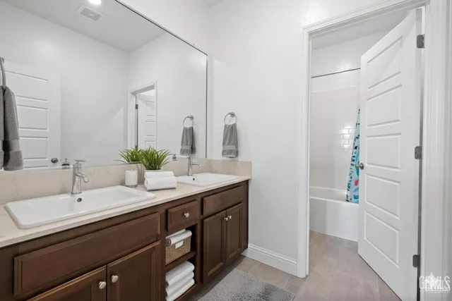 an aerial view of house with a yard