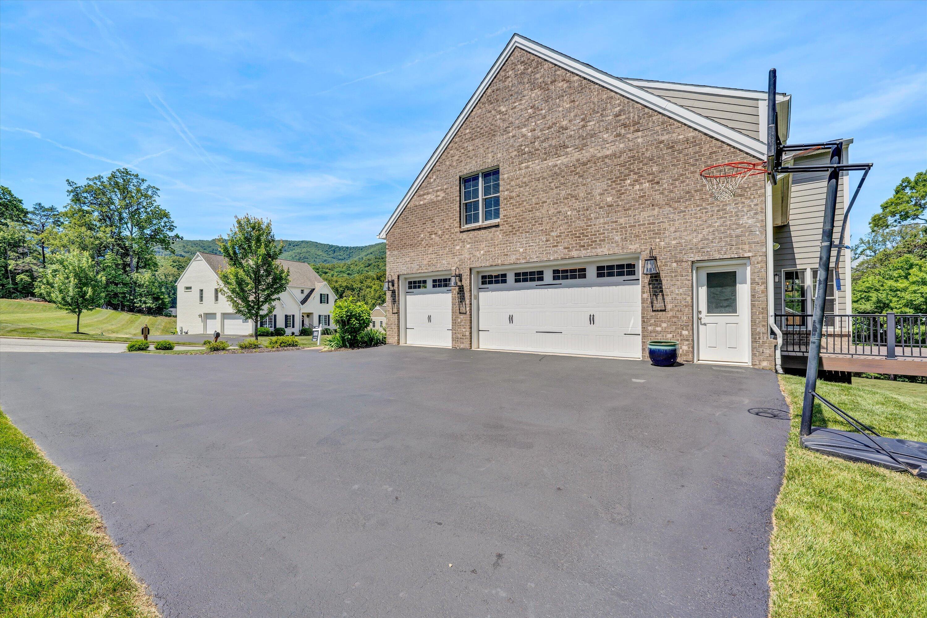 6981 Fairway Ridge Road Salem, VA 24153 - Photo 7 of 53 a view of a house with a yard and potted plants