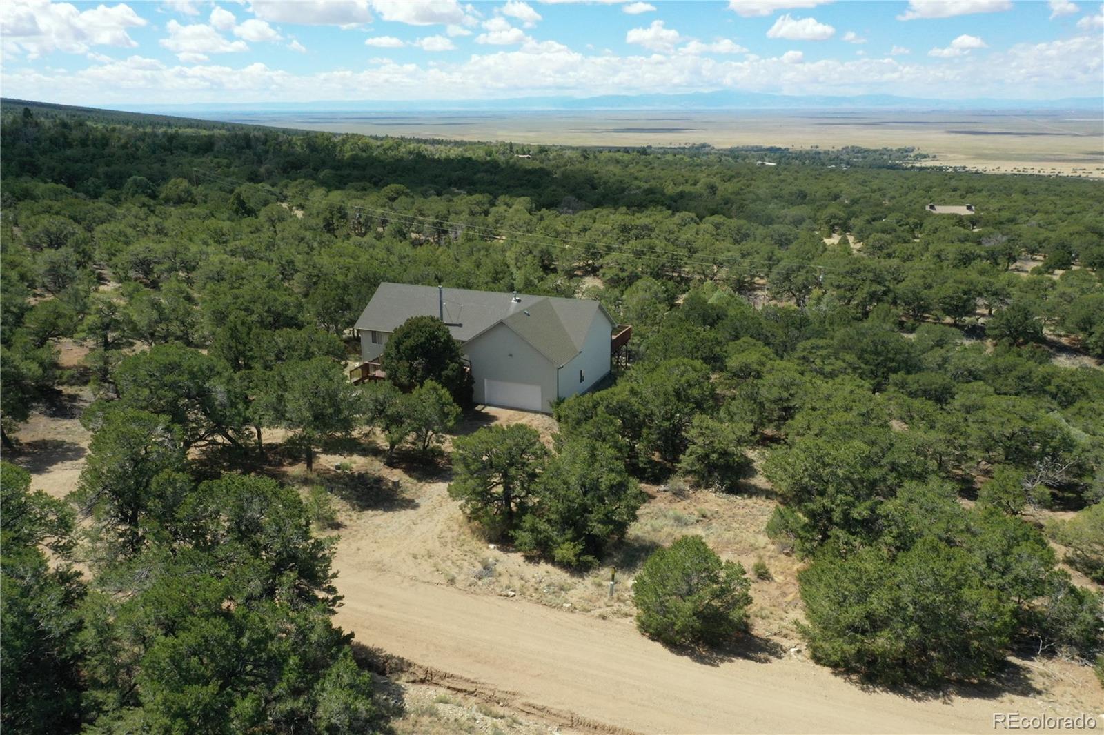 162 Cedar Ridge Road Mosca, CO 81146 - Photo 19 of 24 a view of a city