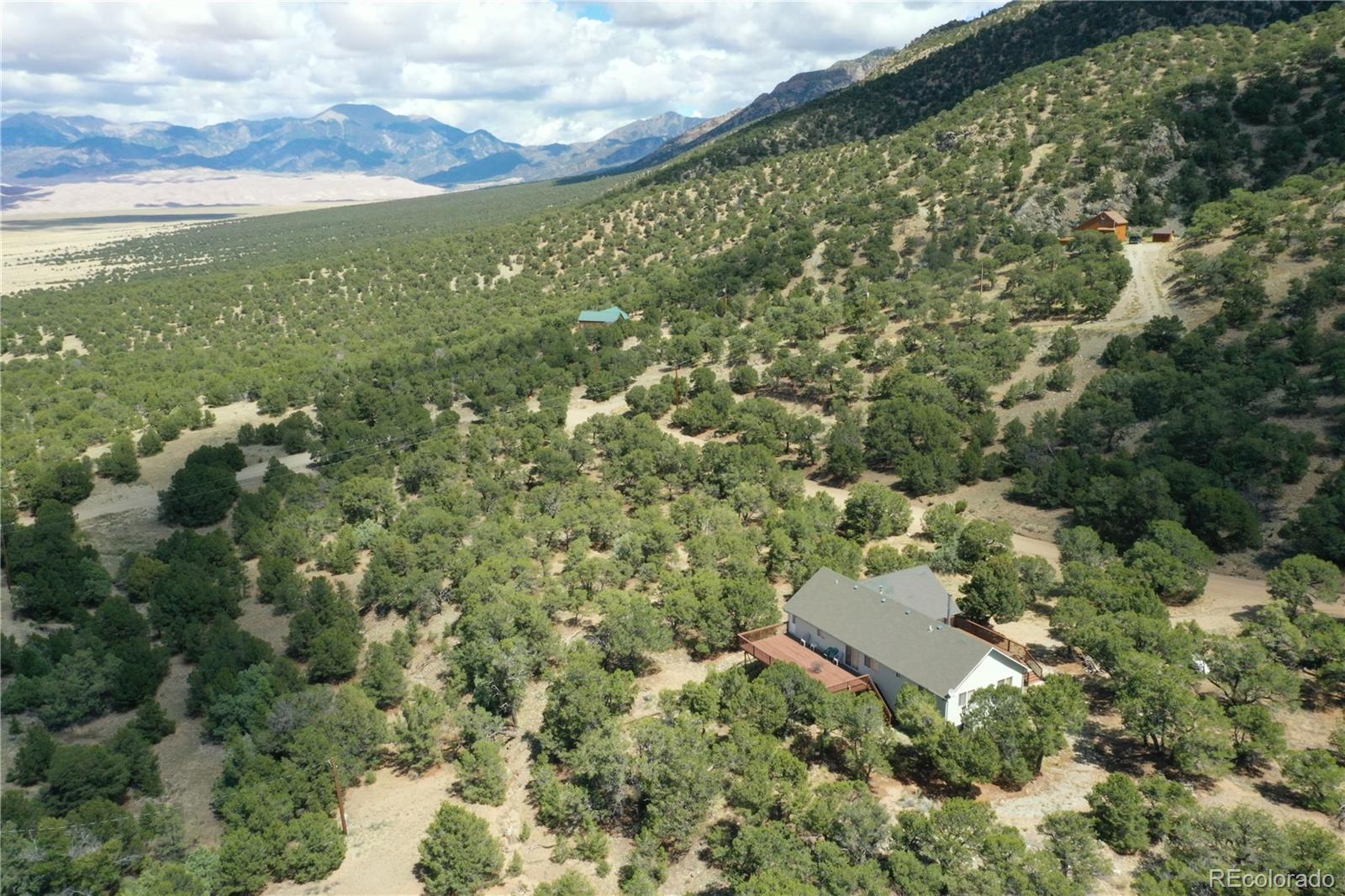 162 Cedar Ridge Road Mosca, CO 81146 - Photo 20 of 24 a view of a city