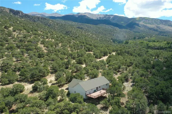 a view of a house with a mountain