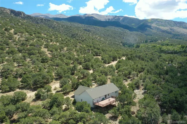 a view of a house with a mountain
